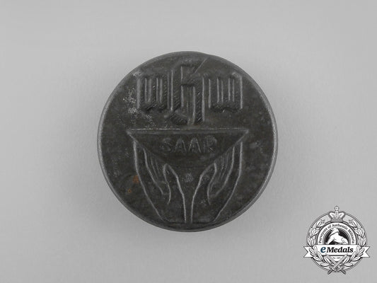 a_third_reich_period_saar_whw(_winter_aid_of_the_german_people)_donation_badge_aa_8839