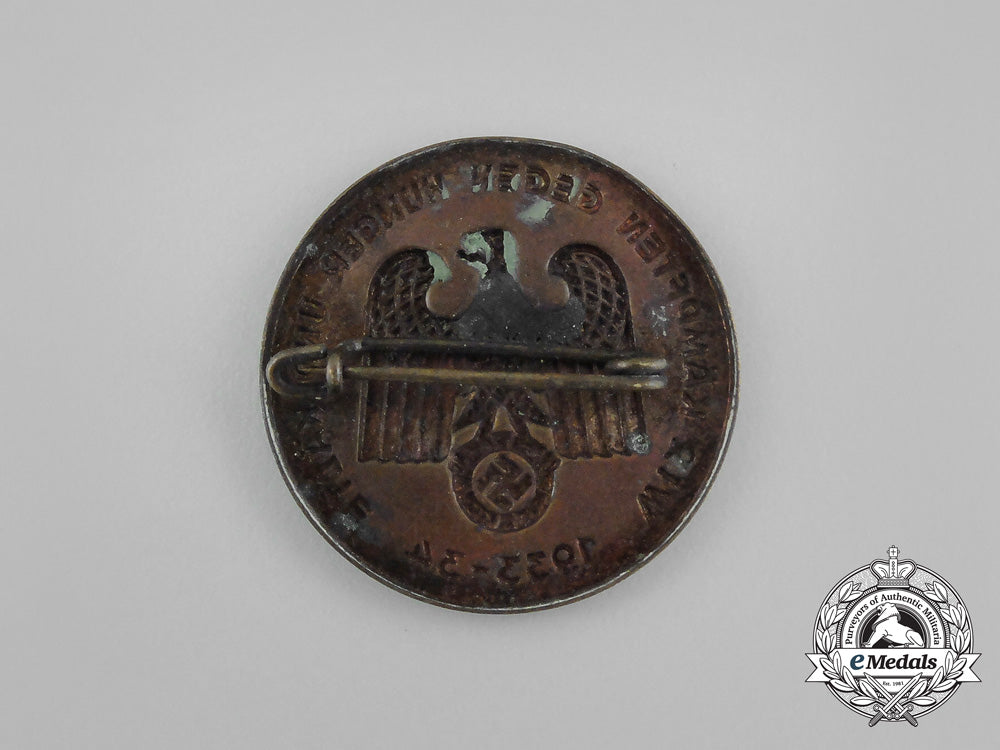 a_third_reich_period_whw“_we_are_fighting_against_hunger_and_the_cold”_donation_badge_aa_8845