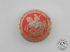 A Third Reich Period “Secure The Path Over Hunger And The Cold” Donation Badge