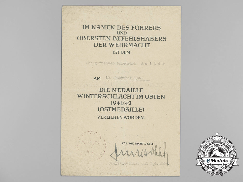 germany,_heer._a_eastern_front_medal_award_document_to_obergefreiter_friedrich_wolter_aa_9031