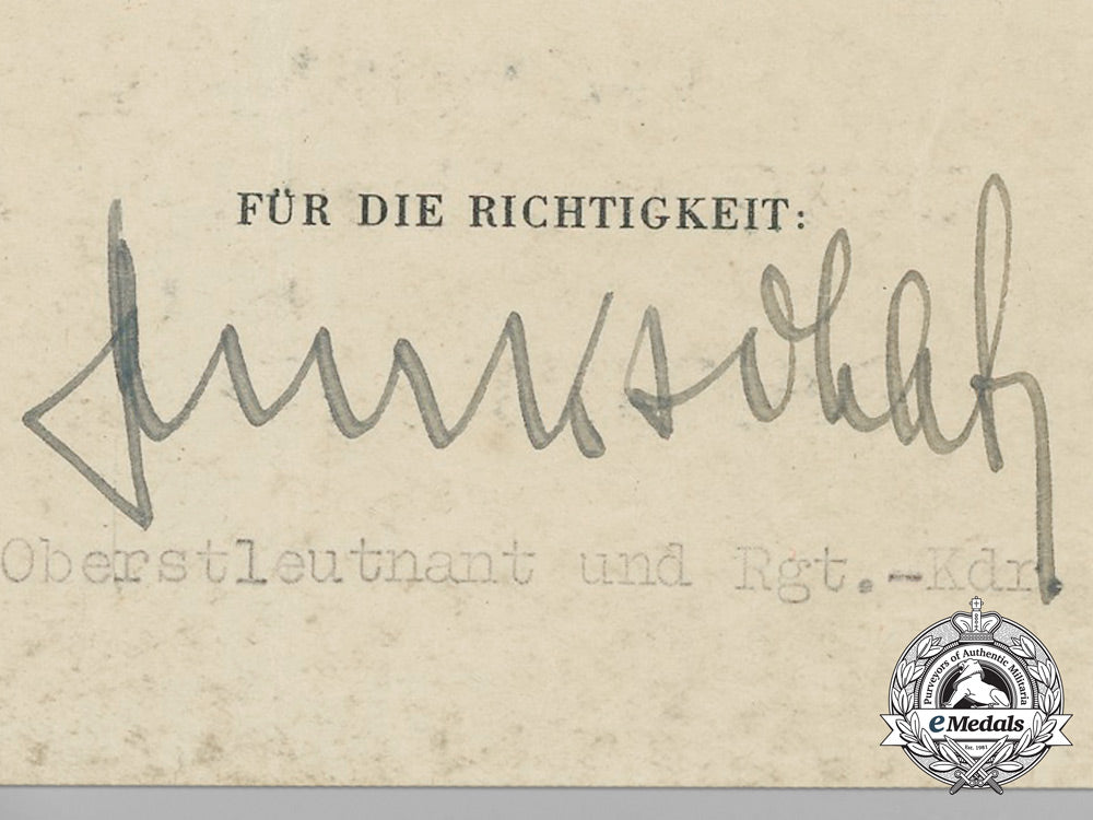 germany,_heer._a_eastern_front_medal_award_document_to_obergefreiter_friedrich_wolter_aa_9032