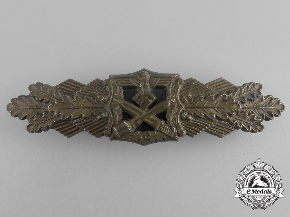 a_bronze_grade_close_combat_clasp_by_arbeitsgemeinschaft_metal_und_kunstoff_of_gablonz_aa_9270