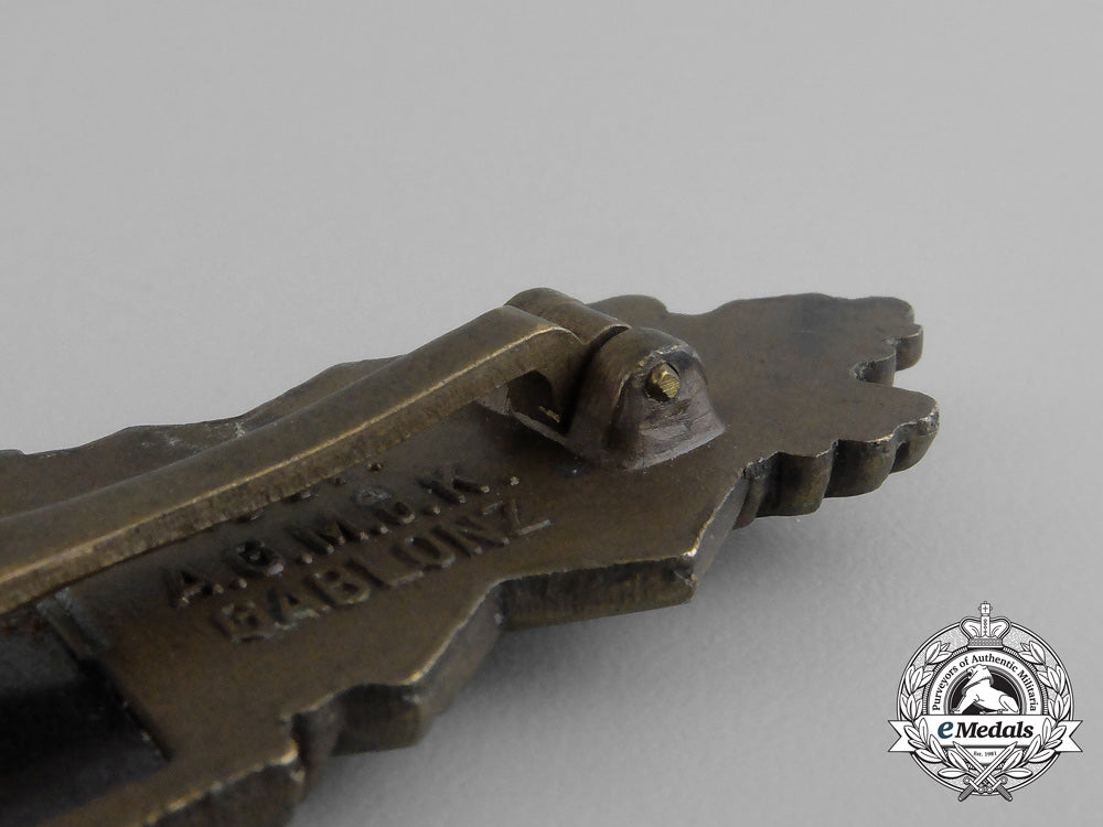 a_bronze_grade_close_combat_clasp_by_arbeitsgemeinschaft_metal_und_kunstoff_of_gablonz_aa_9278