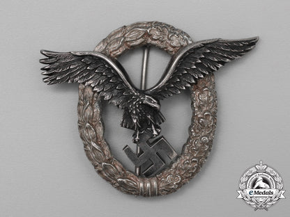 a_fine_early_quality_manufacture_luftwaffe_pilot’s_badge_by_c._e._juncker_of_berlin_aa_9398