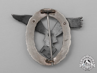 a_fine_early_quality_manufacture_luftwaffe_pilot’s_badge_by_c._e._juncker_of_berlin_aa_9399