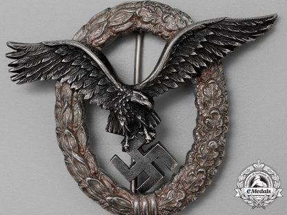 a_fine_early_quality_manufacture_luftwaffe_pilot’s_badge_by_c._e._juncker_of_berlin_aa_9400