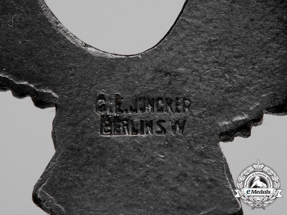 a_fine_early_quality_manufacture_luftwaffe_pilot’s_badge_by_c._e._juncker_of_berlin_aa_9401