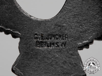 a_fine_early_quality_manufacture_luftwaffe_pilot’s_badge_by_c._e._juncker_of_berlin_aa_9401