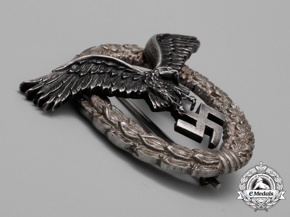 a_fine_early_quality_manufacture_luftwaffe_pilot’s_badge_by_c._e._juncker_of_berlin_aa_9402
