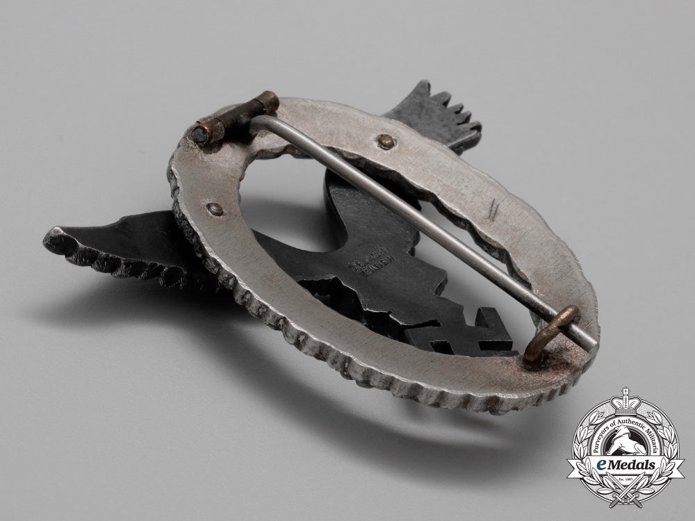 a_fine_early_quality_manufacture_luftwaffe_pilot’s_badge_by_c._e._juncker_of_berlin_aa_9403