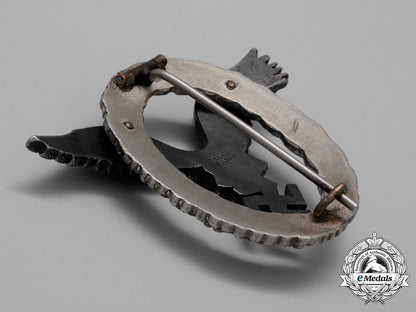 a_fine_early_quality_manufacture_luftwaffe_pilot’s_badge_by_c._e._juncker_of_berlin_aa_9403