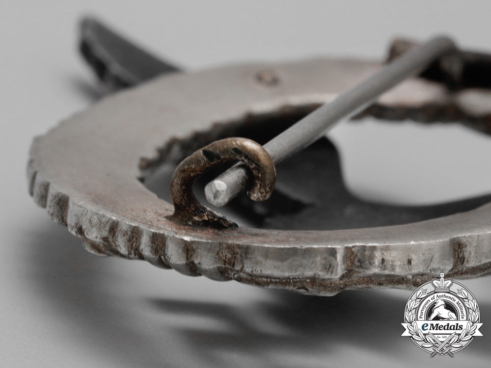 a_fine_early_quality_manufacture_luftwaffe_pilot’s_badge_by_c._e._juncker_of_berlin_aa_9404