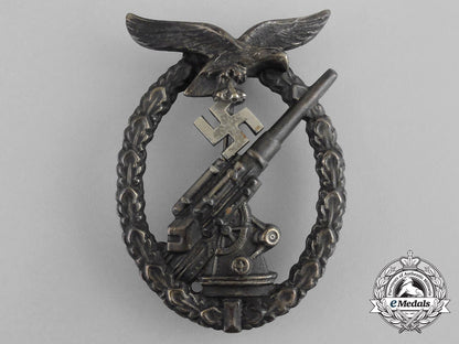 an_early_luftwaffe_flak_badge,_by_juncker,_berlin_aa_9445