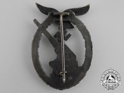 an_early_luftwaffe_flak_badge,_by_juncker,_berlin_aa_9446