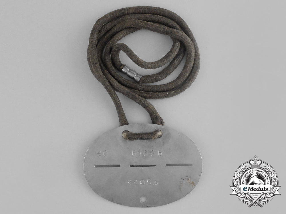 an_unknown_second_war_german_numbered_identification_tag_aa_9584