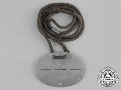 an_unknown_second_war_german_numbered_identification_tag_aa_9584