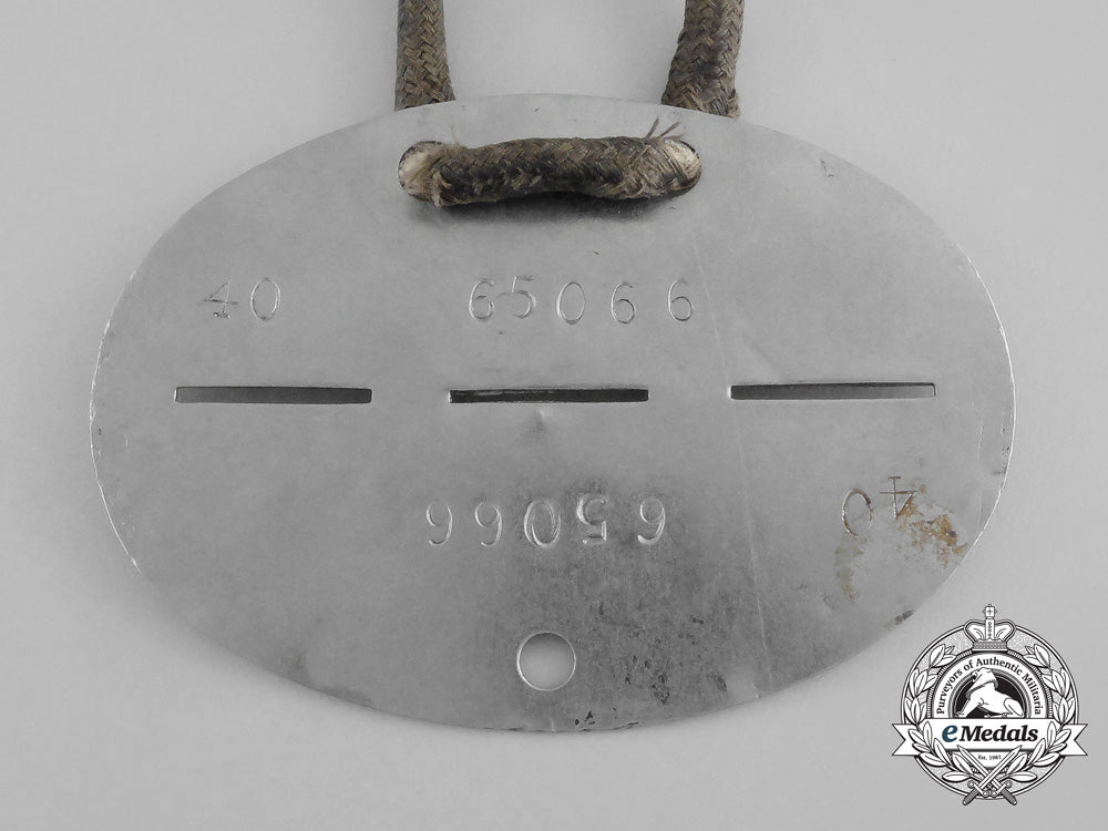 an_unknown_second_war_german_numbered_identification_tag_aa_9585