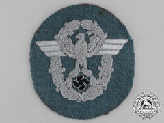 An Unissued German Police Officer’s Bullion Sleeve Eagle; Standard Uniform
