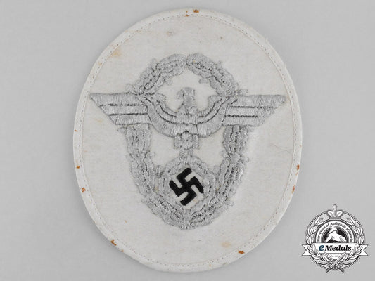 an_unissued_german_police_officer’s_bullion_sleeve_eagle;_white_uniform_aa_9984