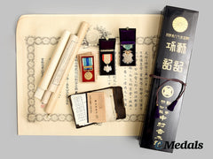 Japan, Empire. A Cased Collection Of Documents & Awards