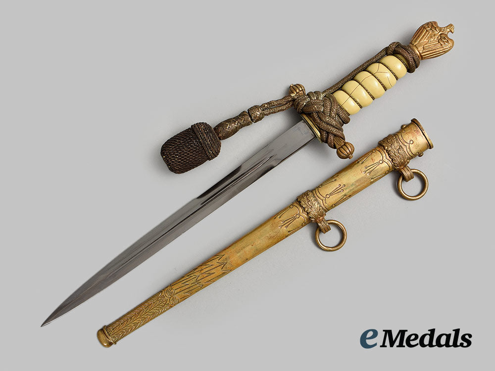 germany,_kriegsmarine._an_officer’s_dress_dagger,_with_veteran-_assembly_hanger_ai1_1706