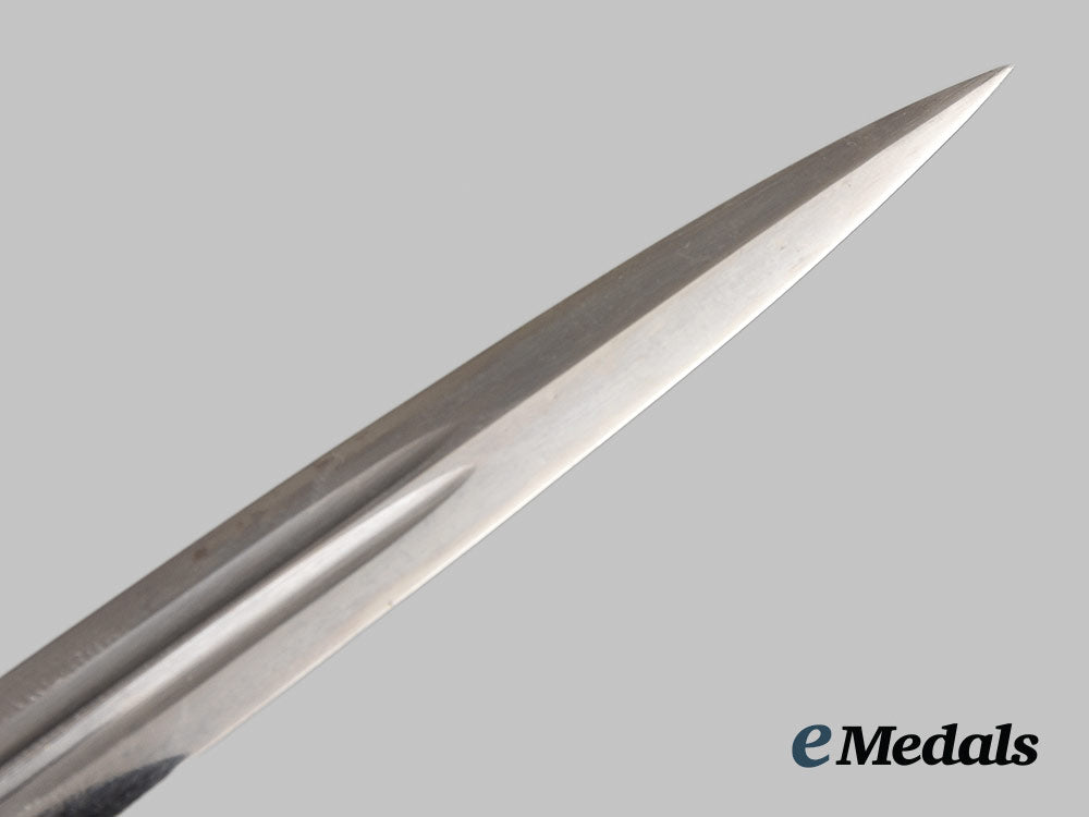 germany,_kriegsmarine._an_officer’s_dress_dagger,_with_veteran-_assembly_hanger_ai1_1707