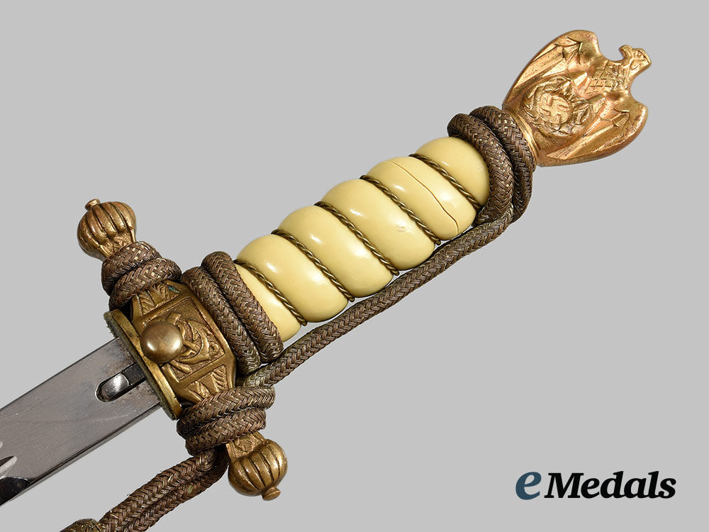 germany,_kriegsmarine._an_officer’s_dress_dagger,_with_veteran-_assembly_hanger_ai1_1708