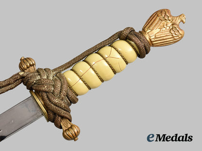 germany,_kriegsmarine._an_officer’s_dress_dagger,_with_veteran-_assembly_hanger_ai1_1709