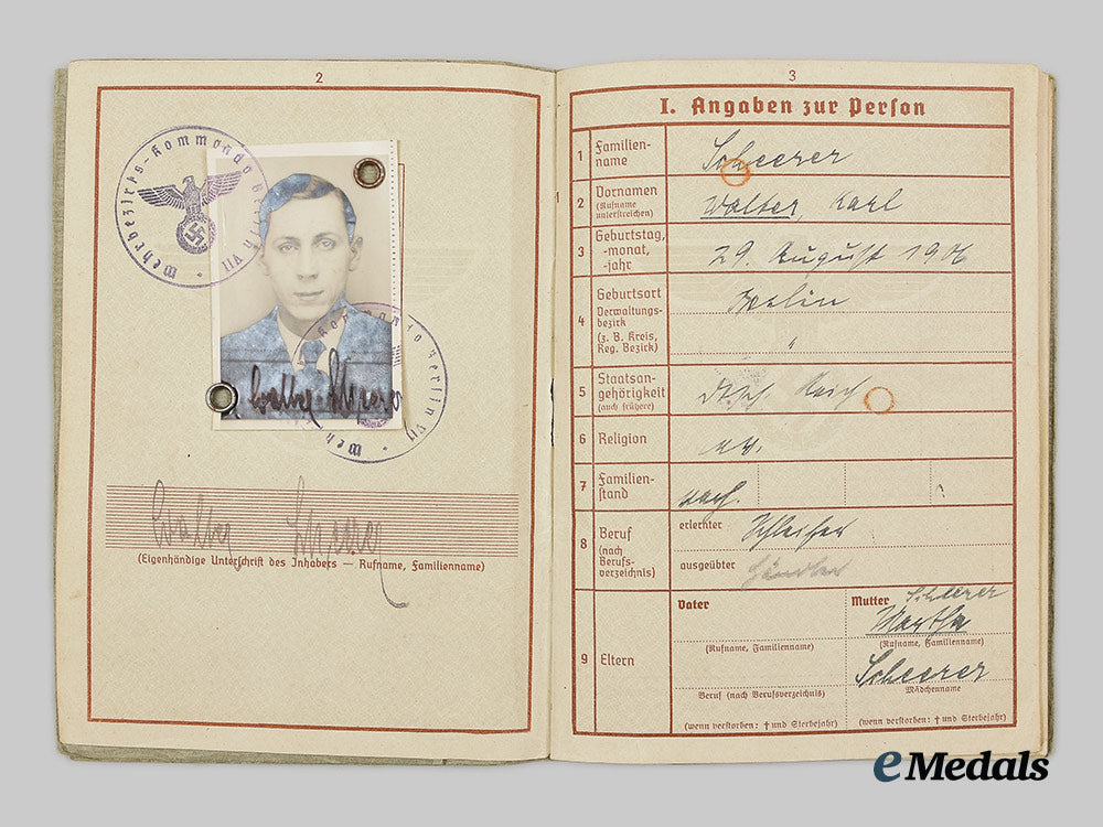 germany,_heer._an_eastern_front_medal_and_wehrpaß_to_obergefreiter_walter_scheerer_ai1_3442