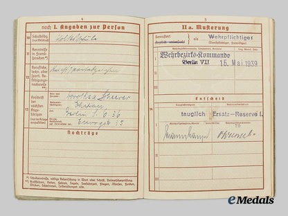 germany,_heer._an_eastern_front_medal_and_wehrpaß_to_obergefreiter_walter_scheerer_ai1_3443