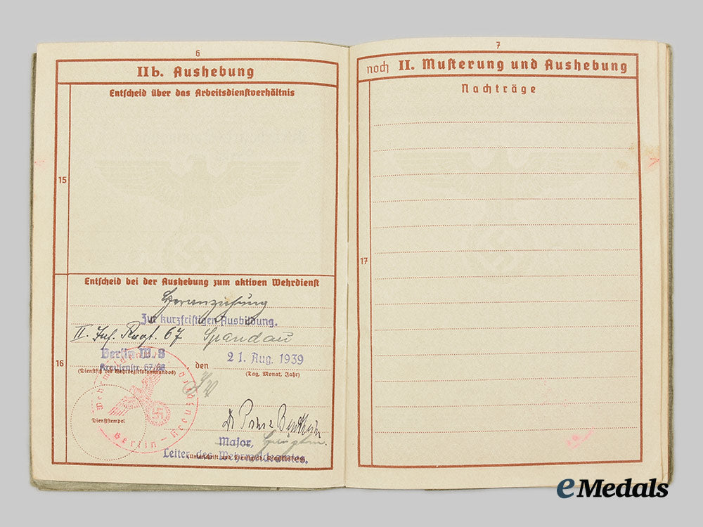 germany,_heer._an_eastern_front_medal_and_wehrpaß_to_obergefreiter_walter_scheerer_ai1_3444
