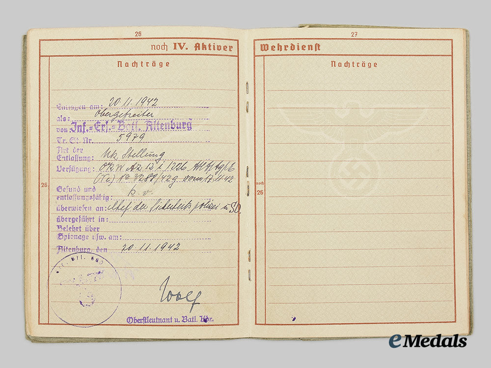 germany,_heer._an_eastern_front_medal_and_wehrpaß_to_obergefreiter_walter_scheerer_ai1_3450