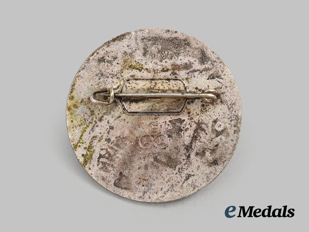 germany,_third_reich._a1936_garmisch-_partenkirchen_winter_olympic_games_badge,_by_friedrich_linden_ai1_3897