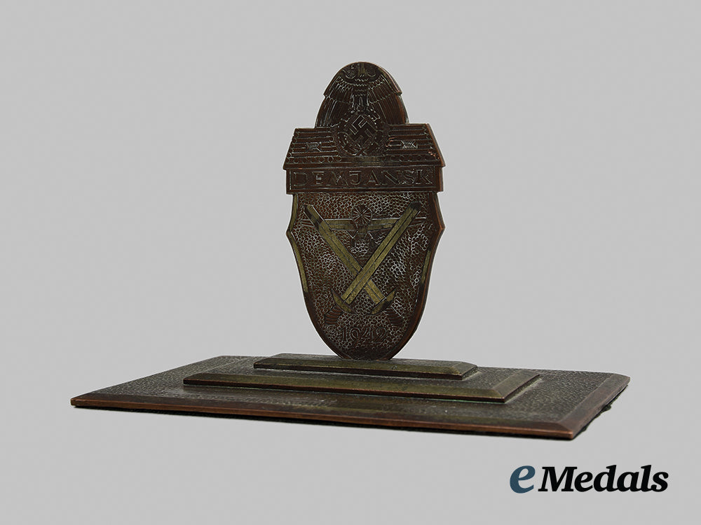 germany,_wehrmacht._a_unit-_attributed_demjansk_shield_desk_ornament_ai1_4535