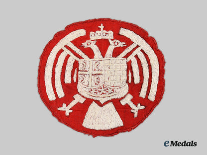 yugoslavia,_kingdom._a_royal_yugoslav_army_insignia,_with_wartime_propaganda_leaflet_ai1_7561