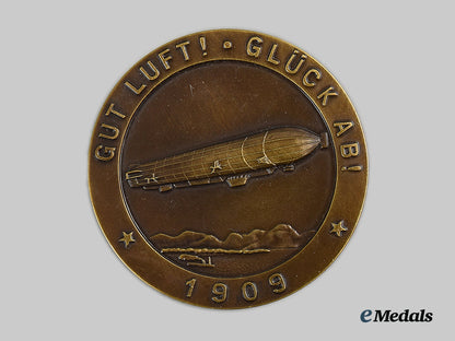 germany,_imperial._a_mint1909_zeppelin_flight_commemorative_table_medal,_by_mayer&_wilhelm_ai1_7682_1