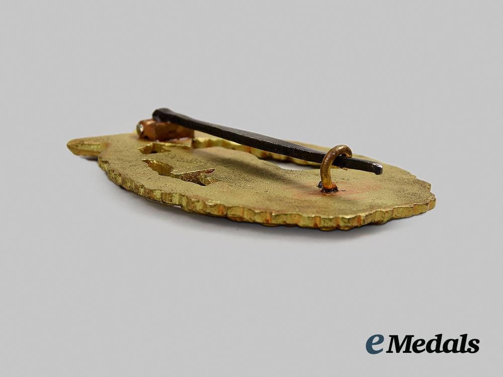 germany,_kriegsmarine._a_fine_auxiliary_cruiser_war_badge,_by_c.e._juncker_ai1_7863