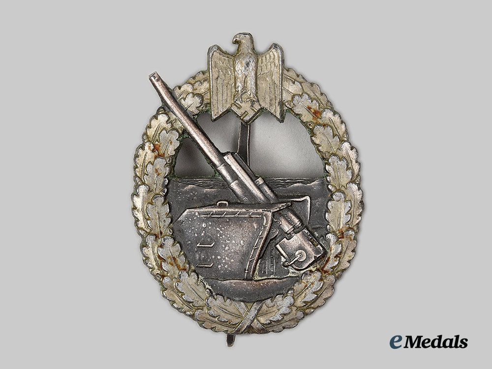 germany,_kriegsmarine._a_coastal_artillery_war_badge,_by_schwerin_ai1_8308