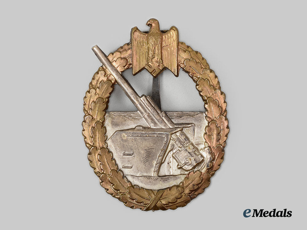 germany,_kriegsmarine._a_coastal_artillery_war_badge,_by_schwerin_ai1_8330-_1_