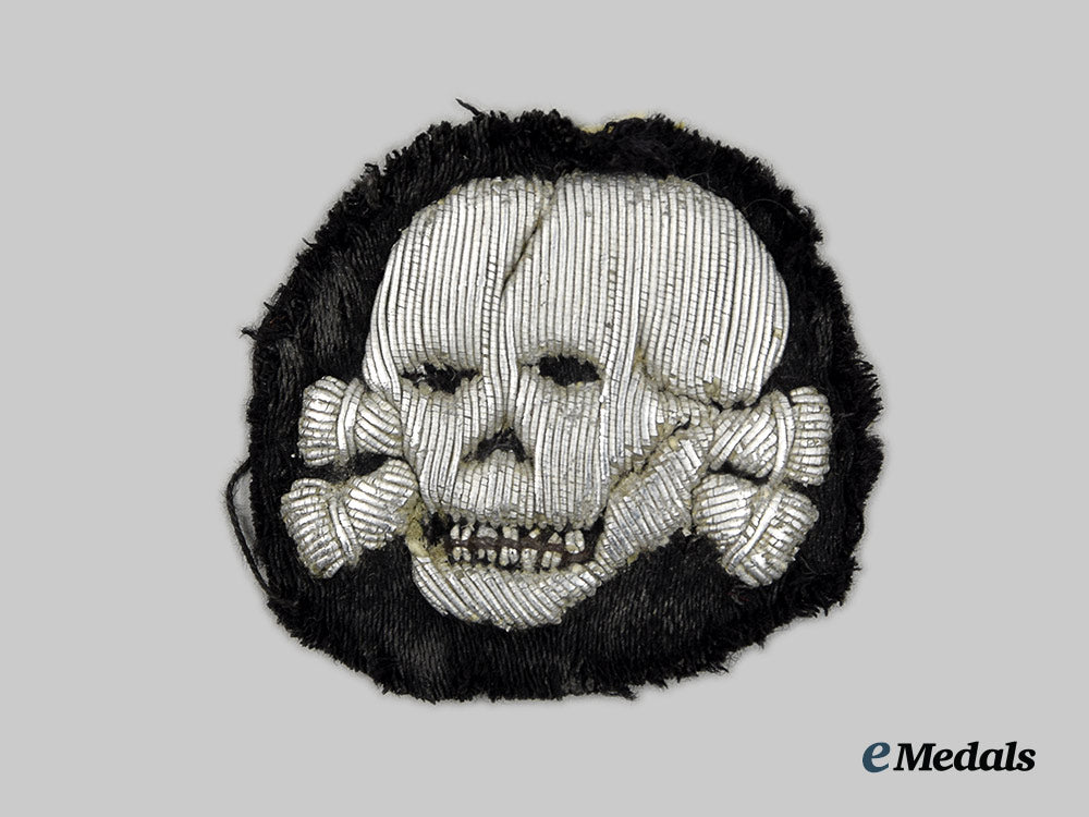 germany,_ss._a_rare_waffen-_ss_officer’s_visor_cap_totenkopf,_collar_tab_cutoff_example_ai1_9321
