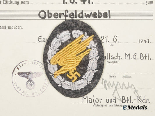 germany,_luftwaffe._a_fallschirmjäger_badge,_cloth_version,_with_promotion_document_to_oberfeldwebel_reichard_hurlebaus_ai23_cbb_7526