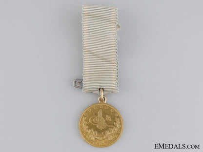 an1862_turkish_medal_of_sishaneli_tufek_in_gold_an_1862_turkish__53f769c73e630