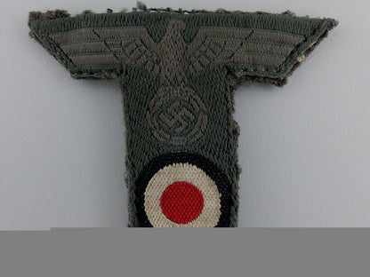 an_army_cap_eagle_with_piece_of_cap_an_army_cap_eagl_5528219a10208