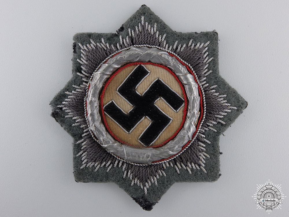 an_army_issue_german_cross_in_gold__an_army_issue_g_550328490cfc8