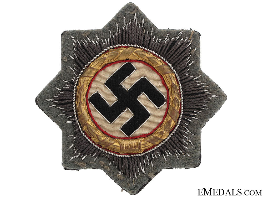 an_army_issue_german_cross_in_gold_an_army_issue_ge_51f128b80ec7e
