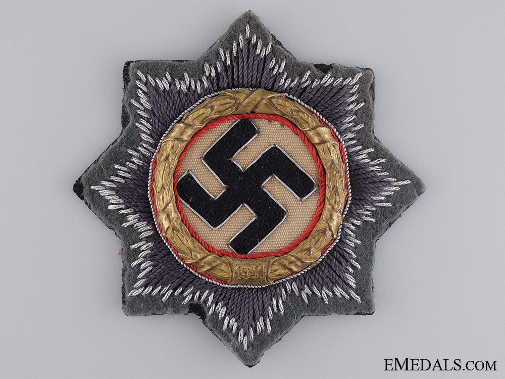 an_army_issue_german_cross_in_gold_an_army_issue_ge_543307cf86342