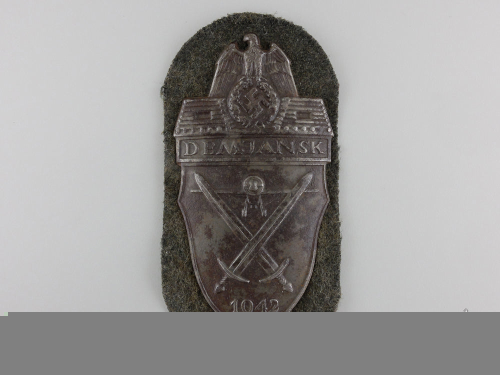 an_army_issued_demjansk_shield_an_army_issued_d_55c224e2193f5