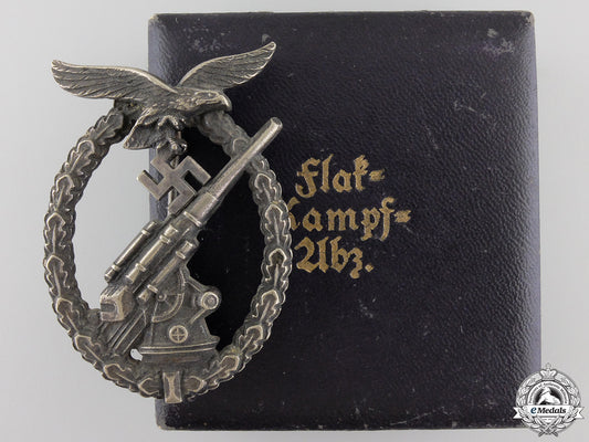 an_early_cased_luftwaffe_flak_badge_by_c.e.juncker_an_early_cased_l_55bf8bef30839