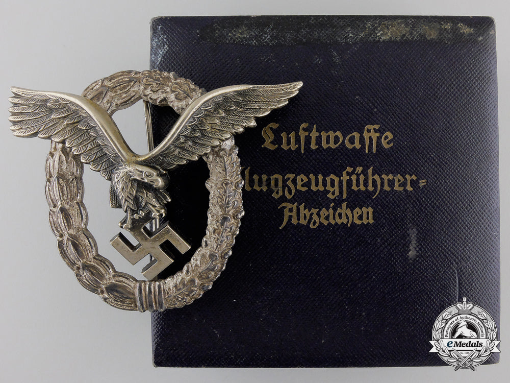 an_early_cased_luftwaffe_pilot's_badge_by_gebrder_wegerhof_an_early_cased_l_55cf5209c39da