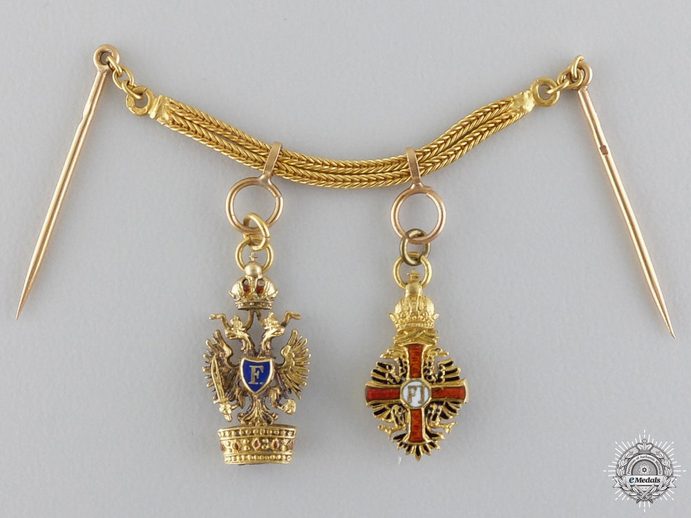 austria,_empire._an_exquisite_franz_joseph&_iron_crown_miniature_pair_in_gold_c.1890_an_exquisite_fra_5477454bbb1f0_1